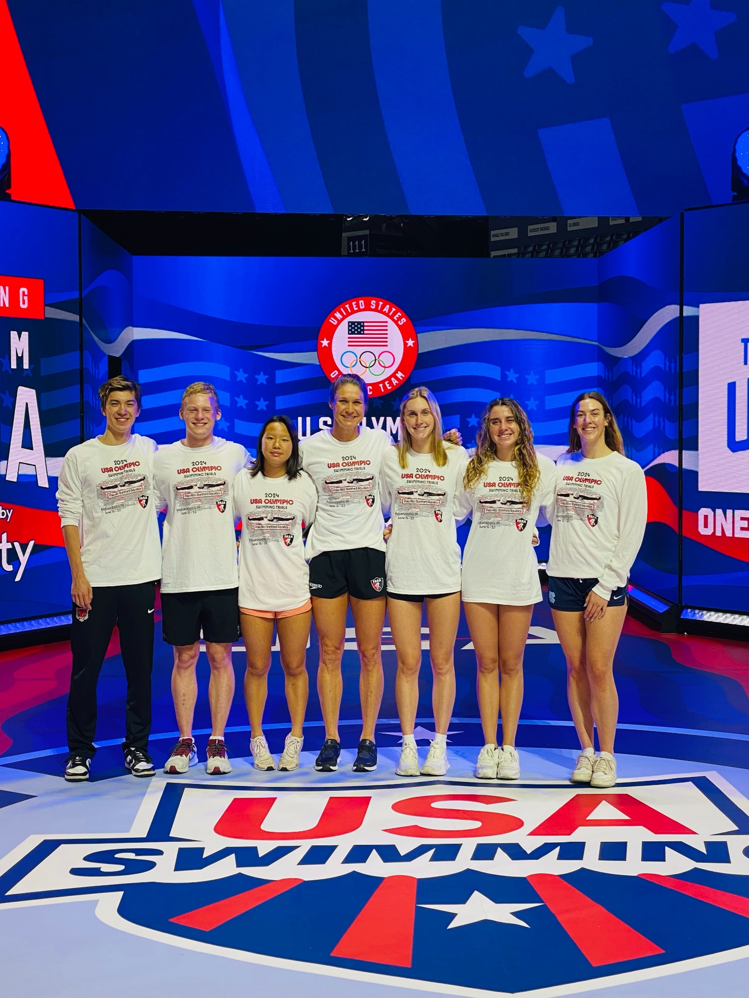 PASA athletes on the podium stage at the 2024 U.S. Olympic Swimming Trials